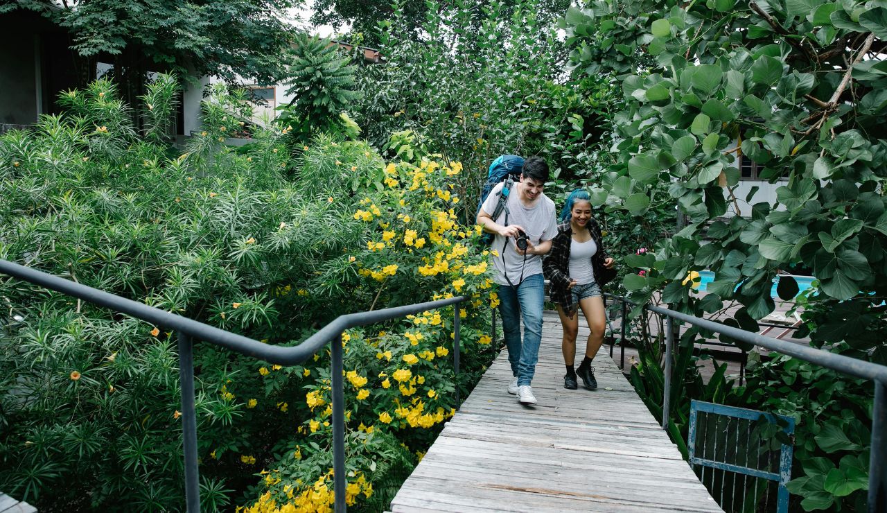 Couple walking along a quiet garden path