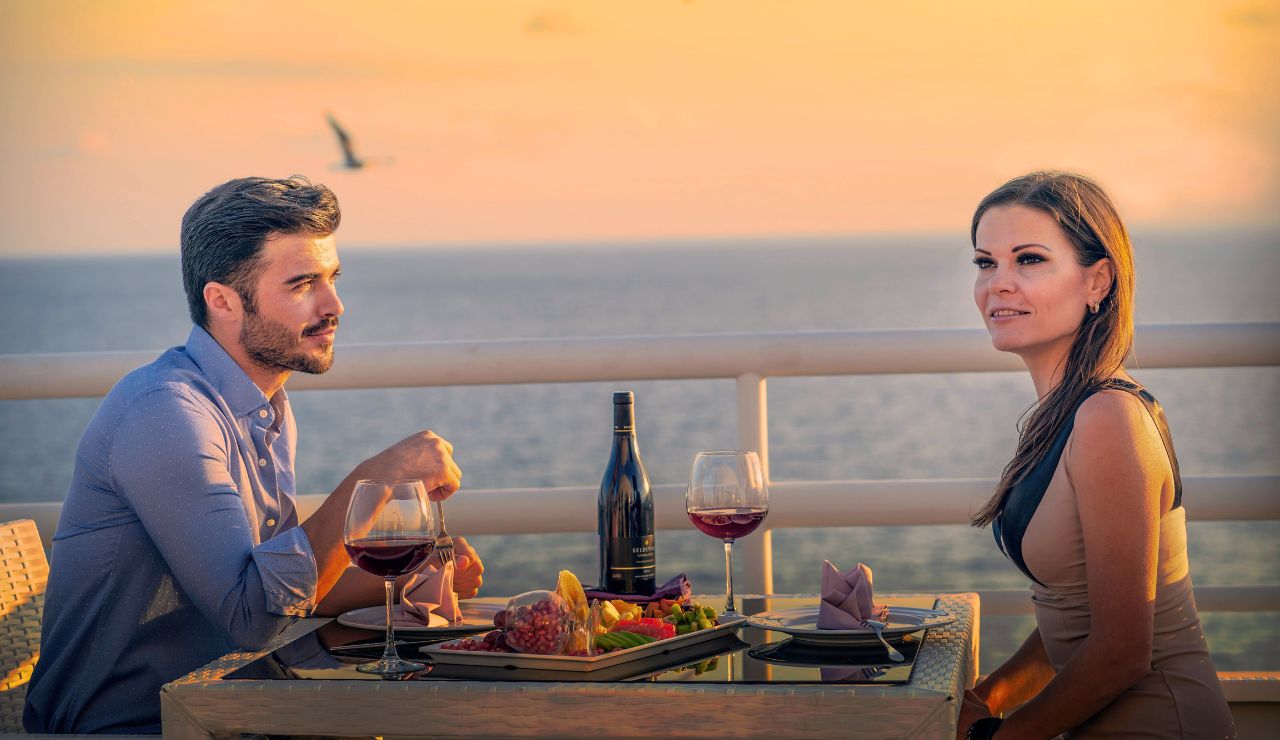 Couples enjoying sunset dining by the water in Islamorada