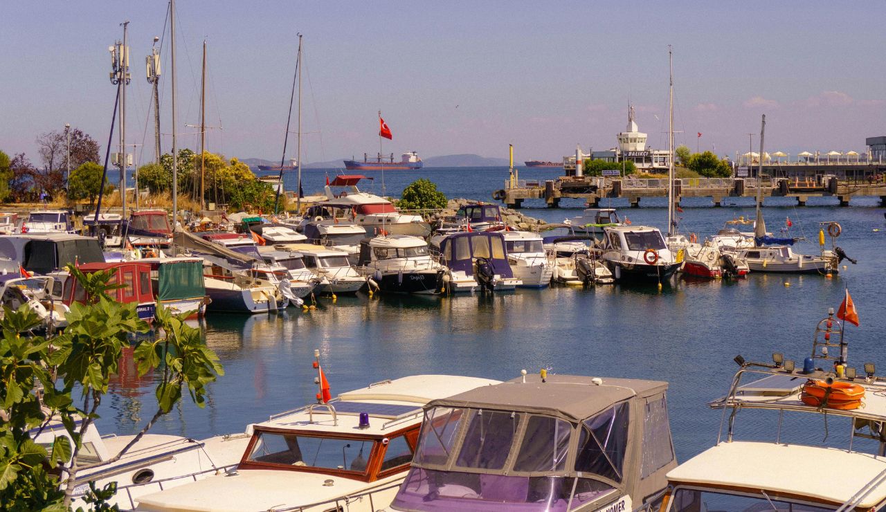  Harbor scene at sunset with sailboats and Lake Superior.