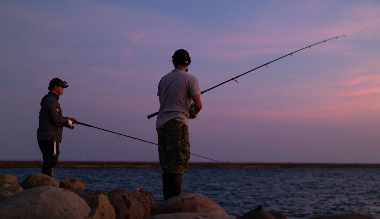  fishing on Lake Winnebago at sunset.”