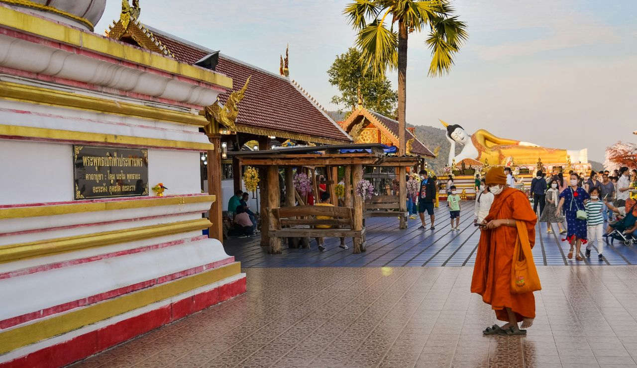 Monks walking in Luang Prabang at sunrise