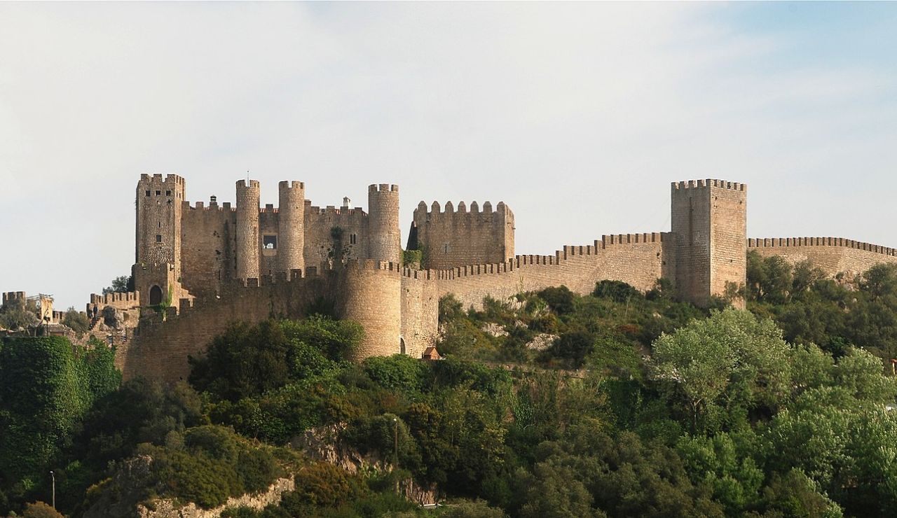 This is the medieval Óbidos Castle in Portugal, known for its well-preserved walls and hilltop views.