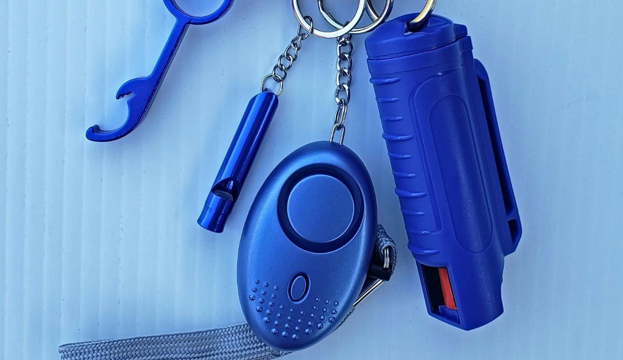 Small personal safety alarm attached.