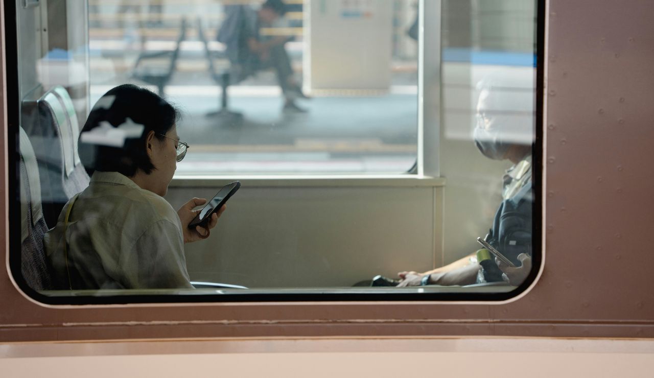  Traveler checking their phone for maps or emergency contacts