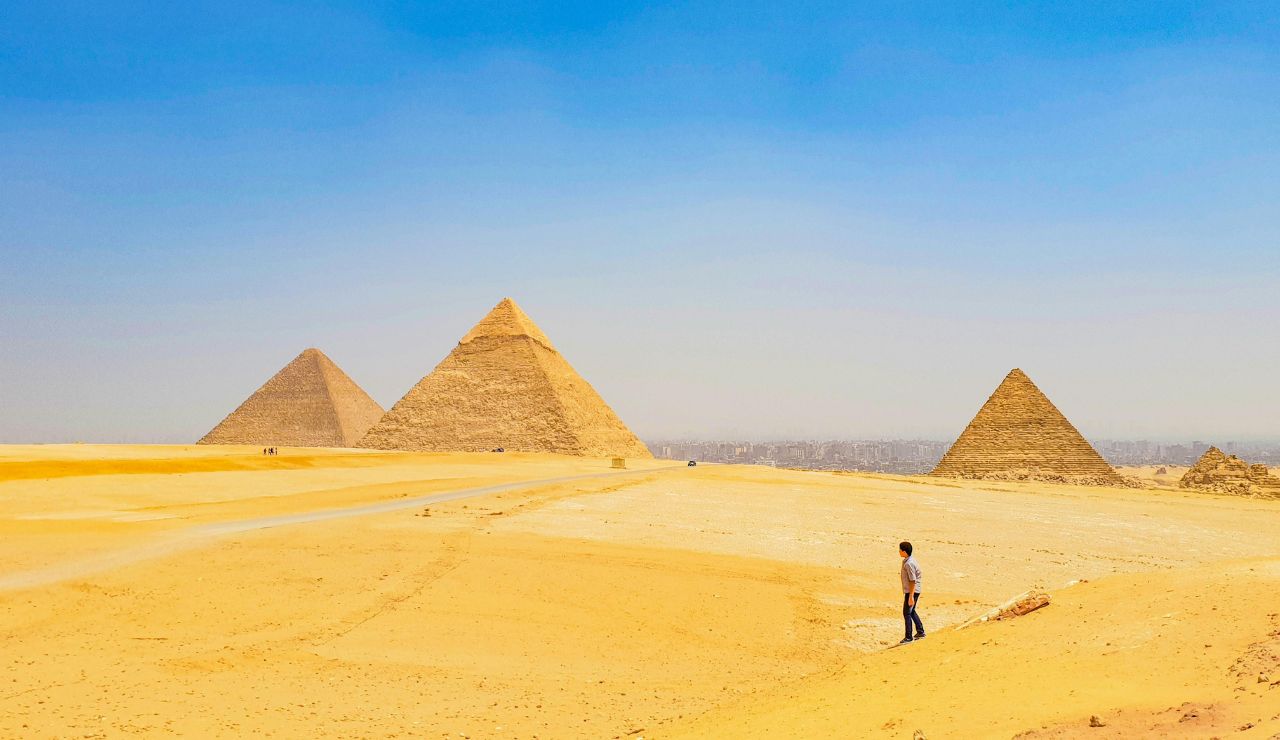 Pyramids of Giza under clear desert sky