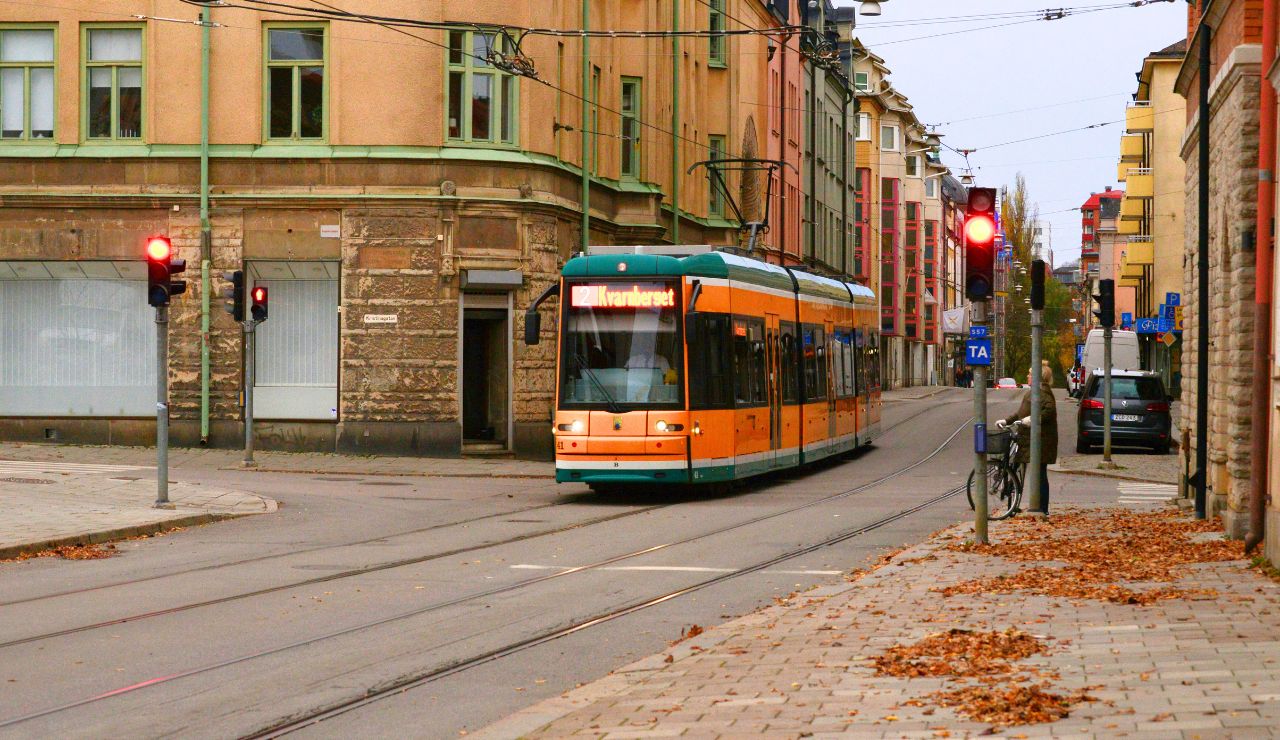 Public tram driving through a scenic town near Montreal