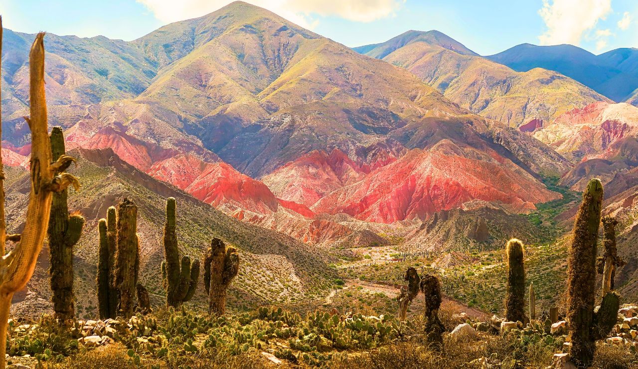 Rainbow-colored hills behind an Andean village in Quebrada de Humahuaca.