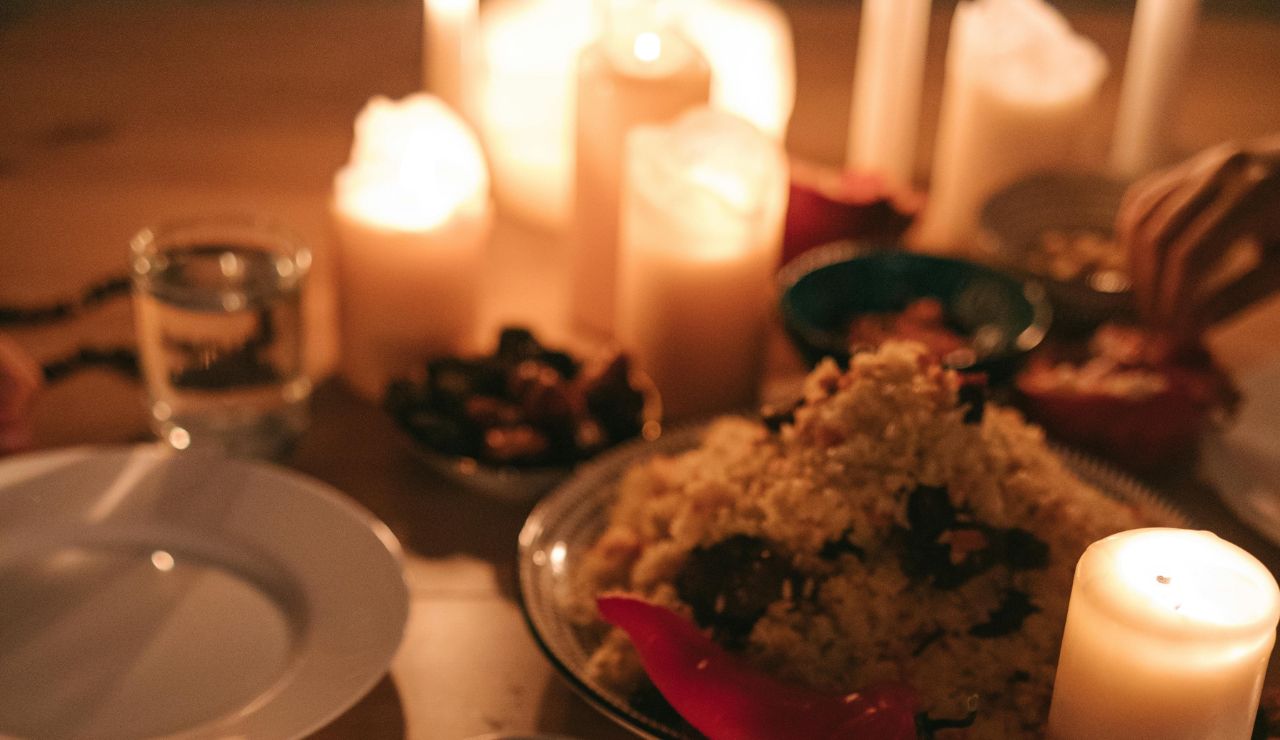 Candlelit dinner setup at a cozy restaurant