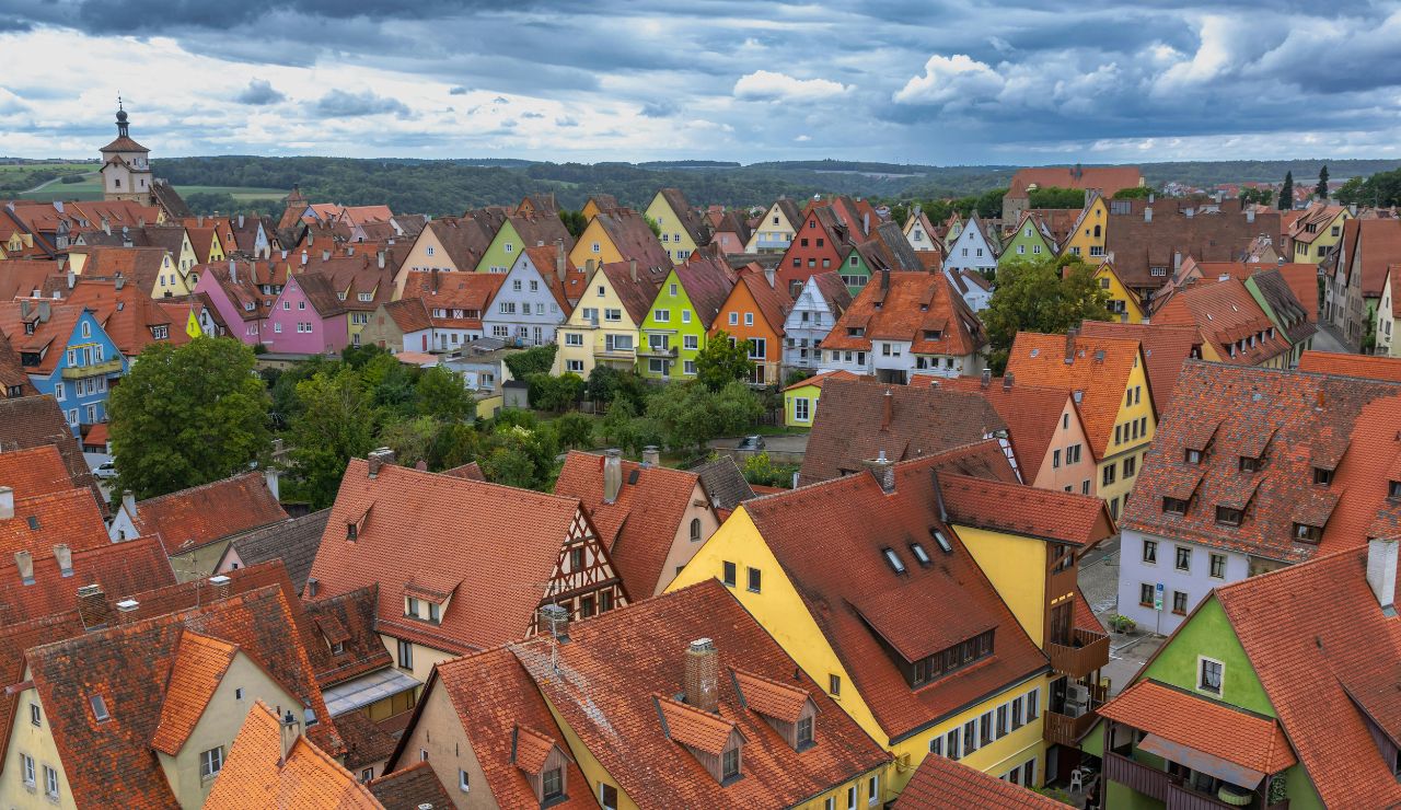 Half-timbered houses and clocktower on a cobbled street in Rothenburg ob der Tauber