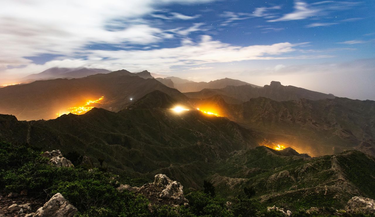 Cloud-covered mountain trail above a village on Saba island