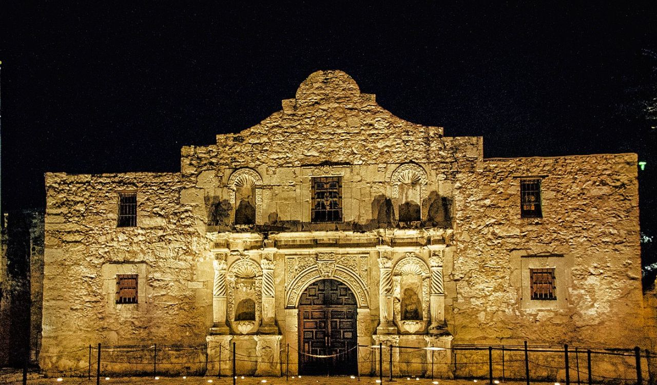 The Alamo in San Antonio, Texas, illuminated at night, showcasing its historic architecture.






