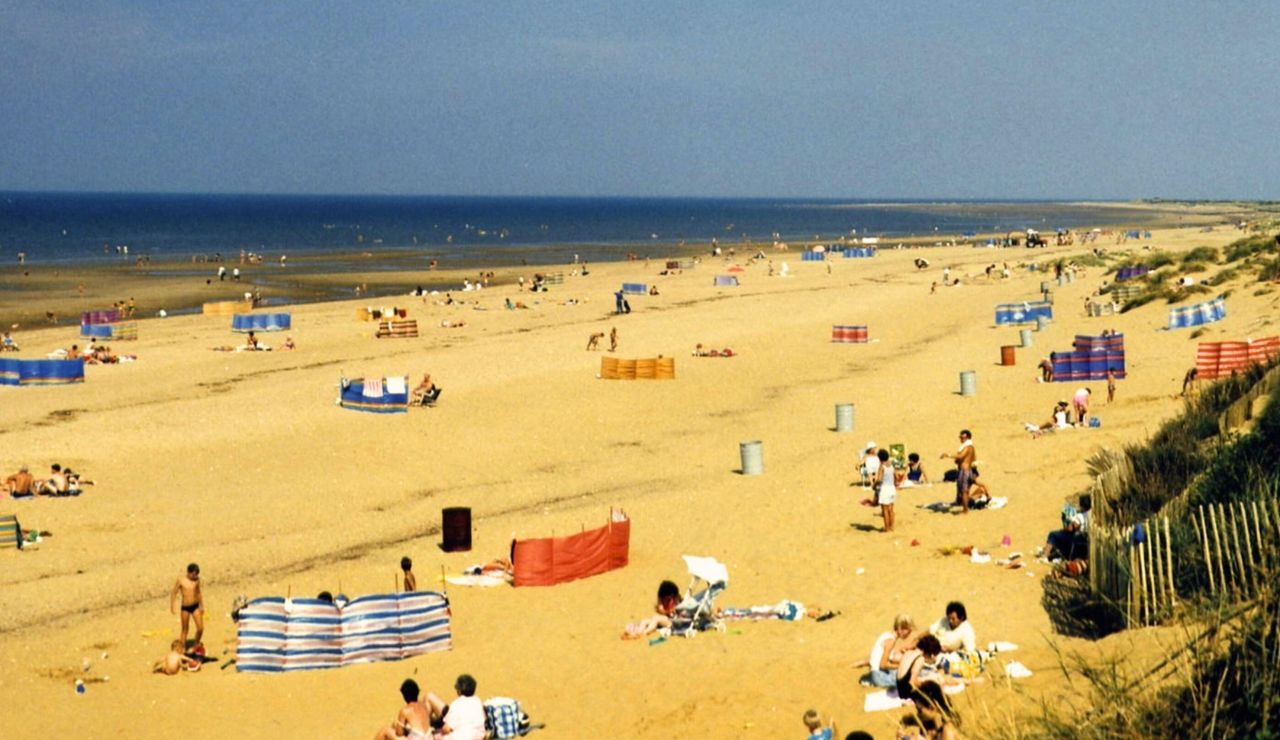 San Sebastián’s La Concha Beach with people enjoying the sunny coast