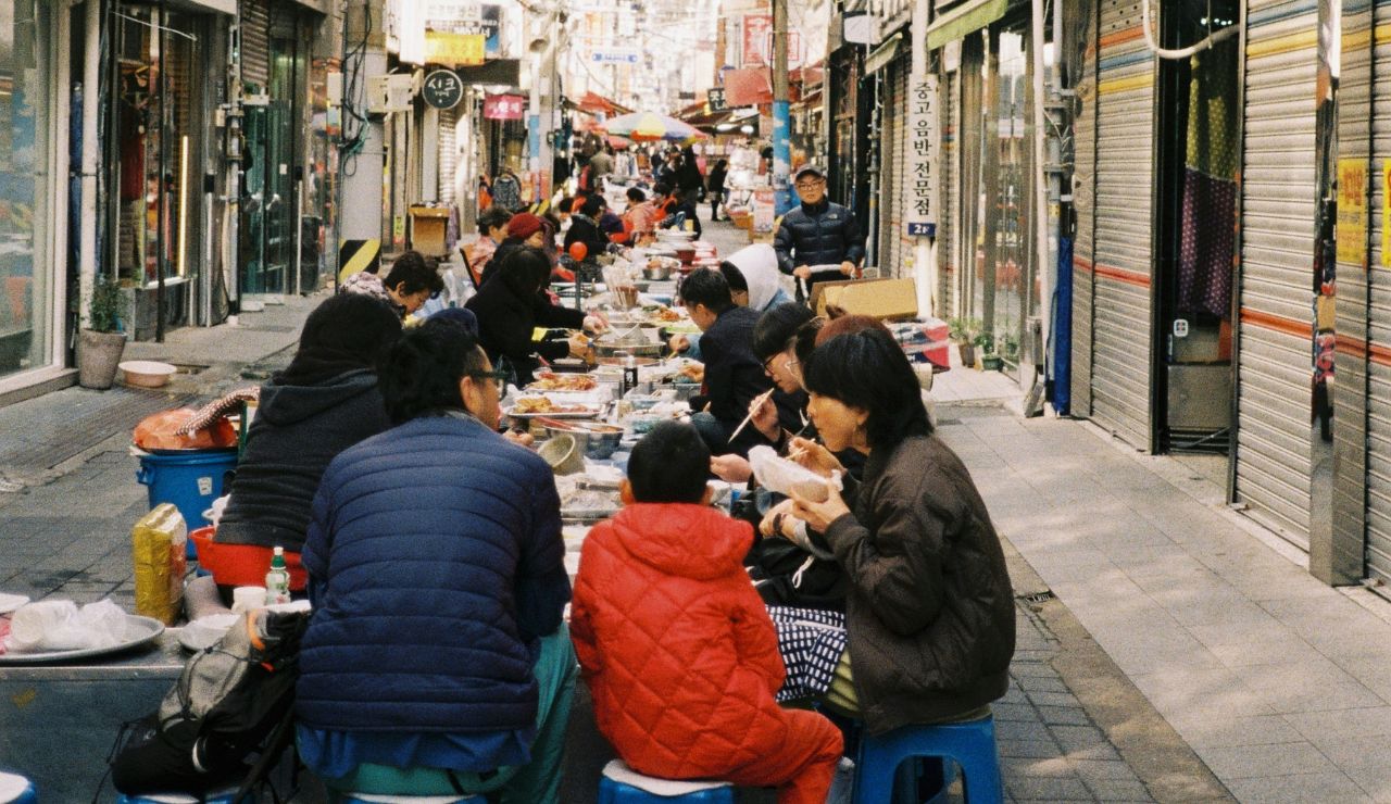 Pintxos bar street in San Sebastián’s Old Town with people dining outside