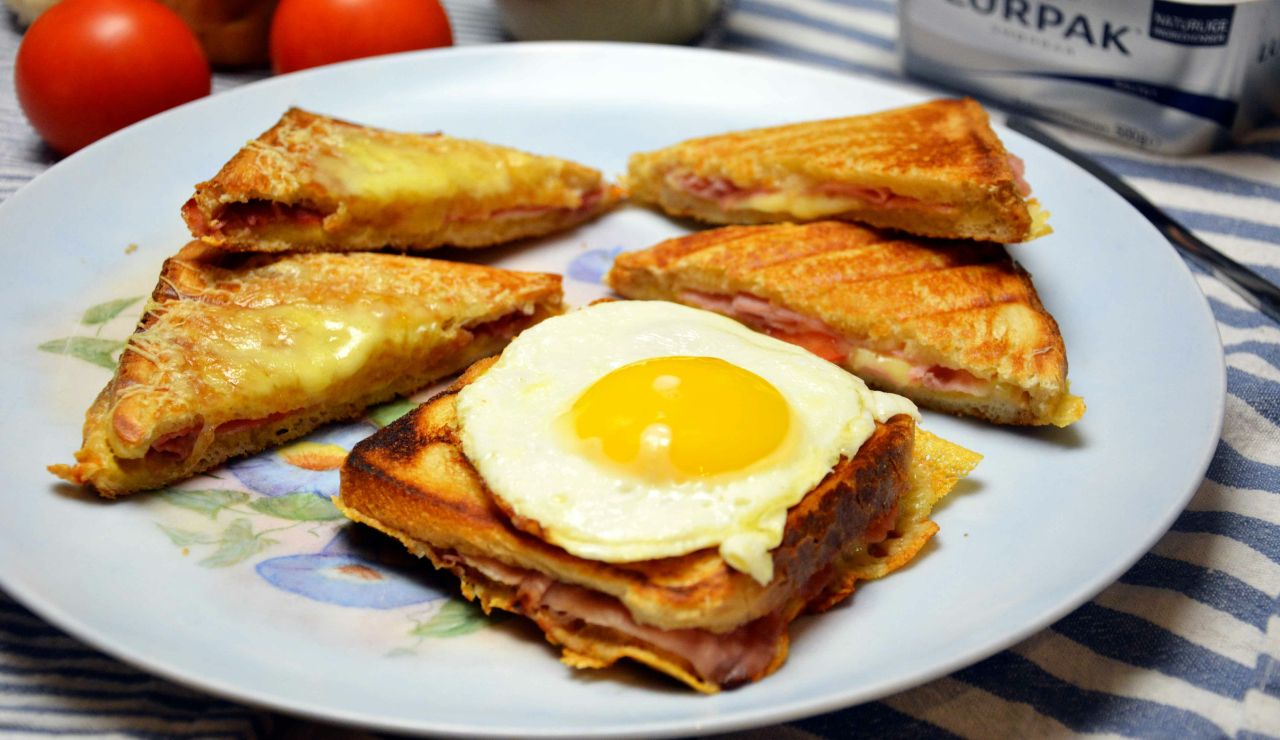 Fried scrapple slices served with eggs