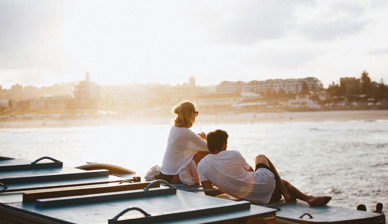 Couple enjoying a sunset sail off the Treasure Coast with champagne in hand.