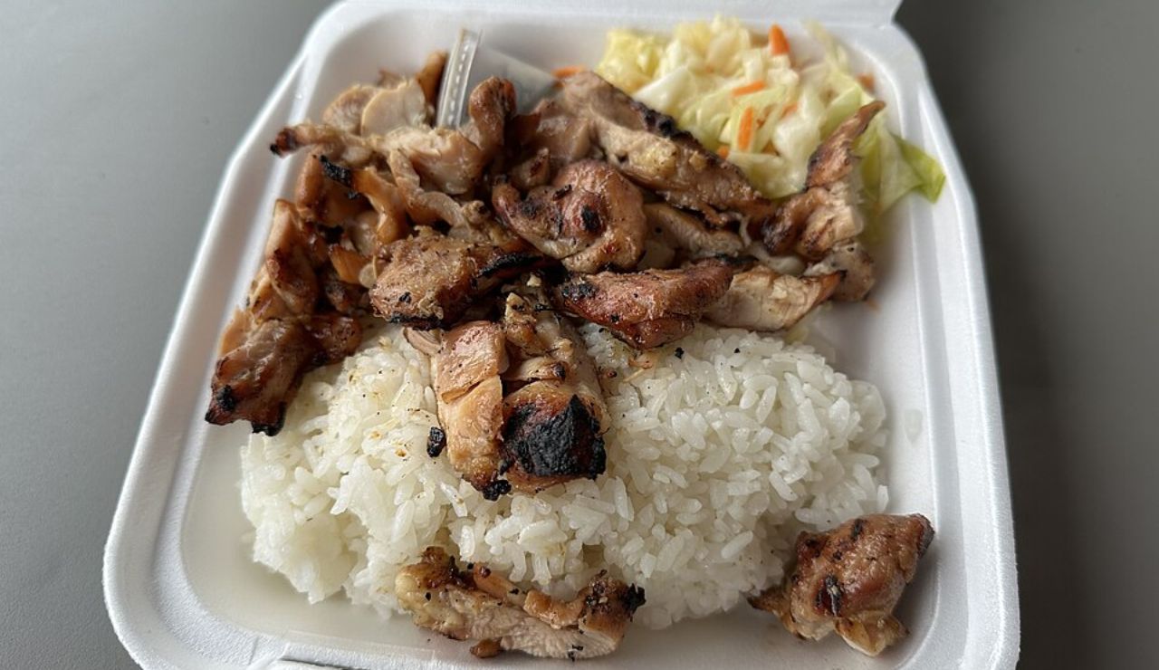 Plate of grilled teriyaki chicken over white rice with slaw from Toshi’s.