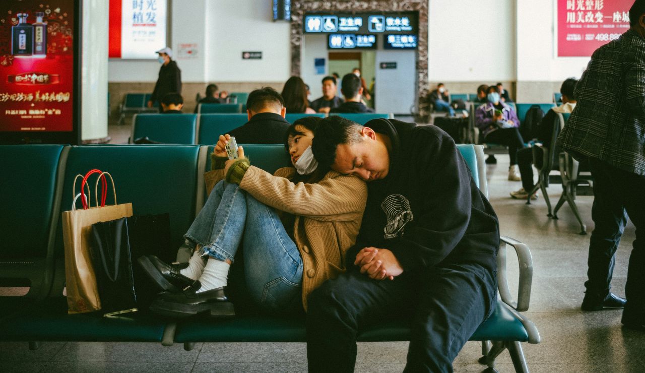 Traveler looking exhausted at the airport