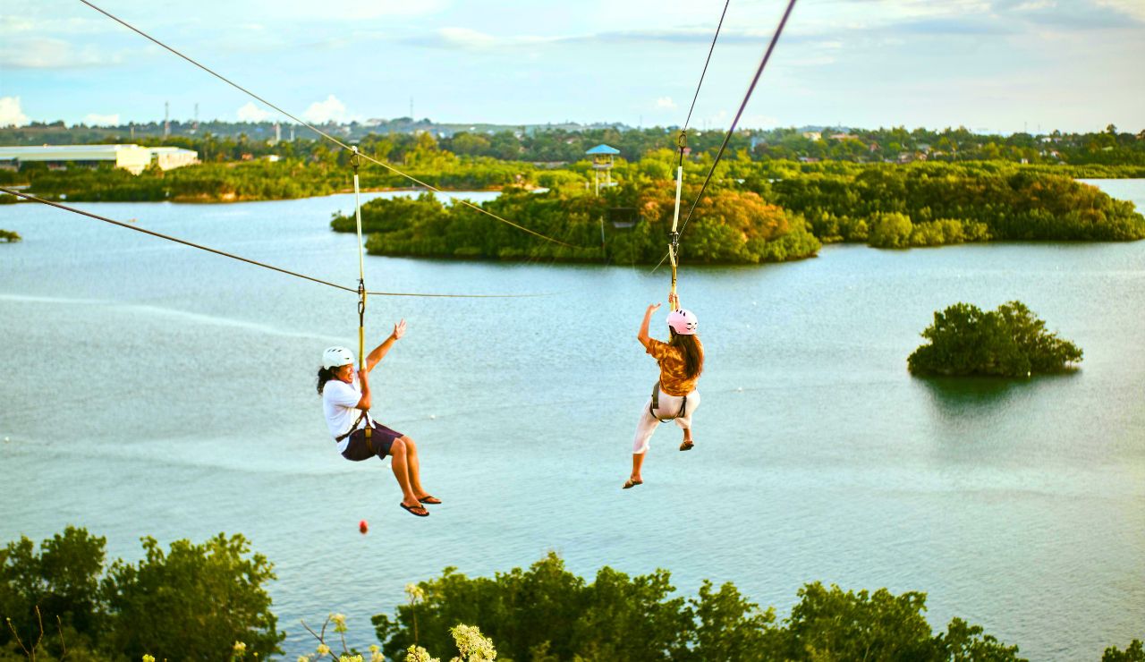 Zipline ride near Rhine Falls with forested backdrop