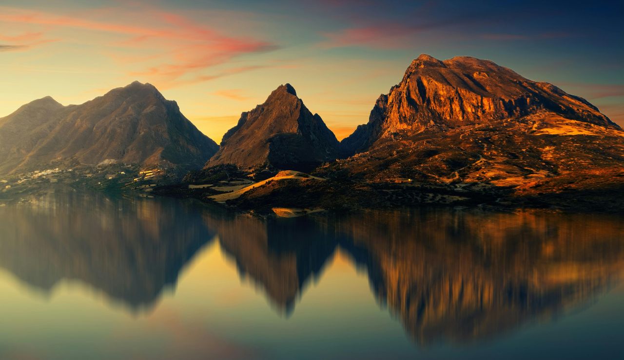 Shallow water creating mirror effect with Steens Mountain in background