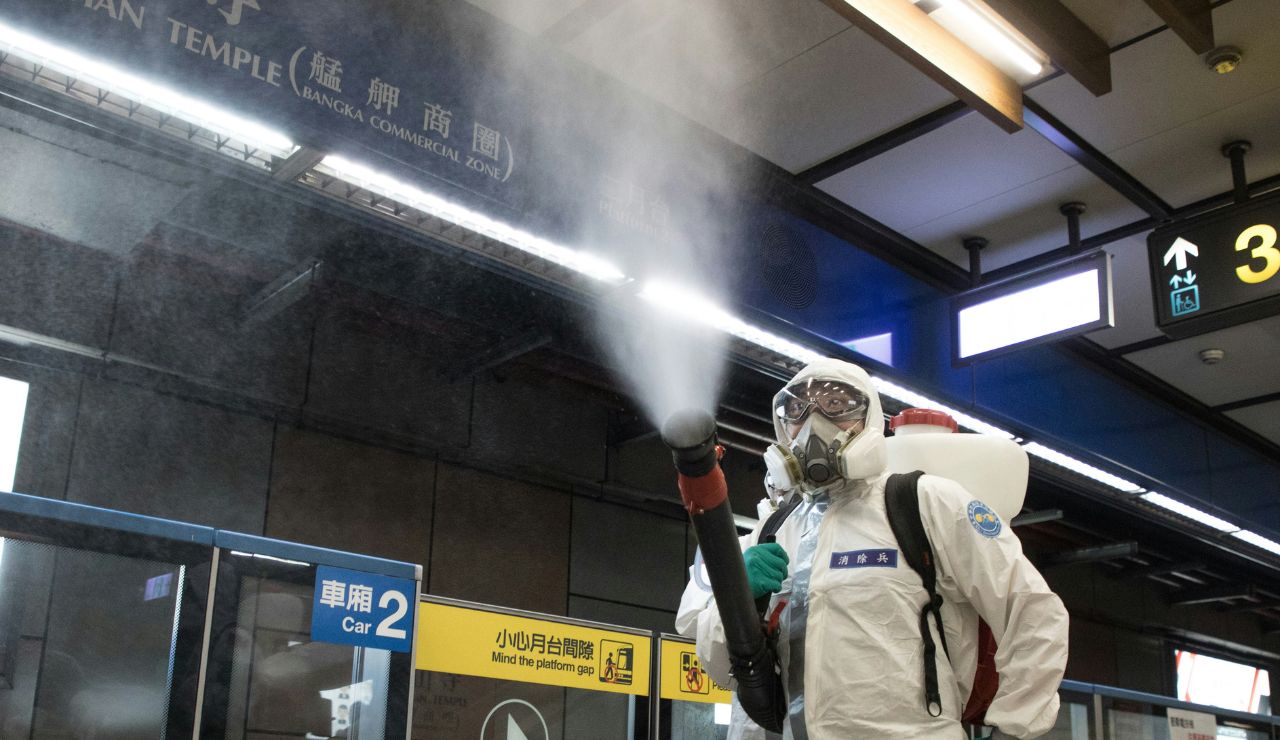 Cleaning at work in a modern Japanese train station.
