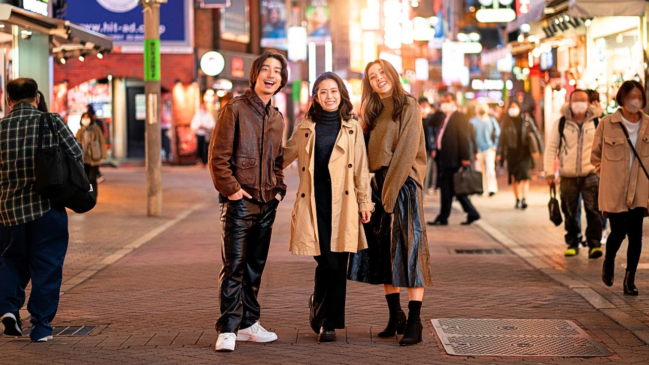 A quiet, spotless street in Japan with people walking peacefully, showcasing cleanliness and order.
