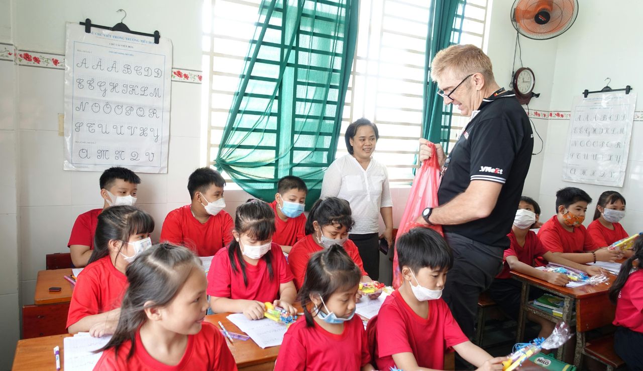 Japanese students working together to clean their school classroom.