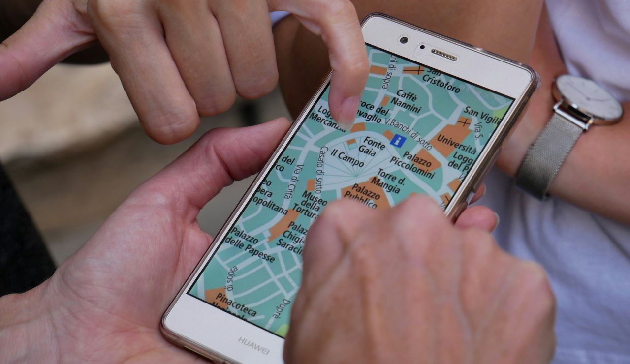 Smartphone showing local ride-share apps while traveling abroad