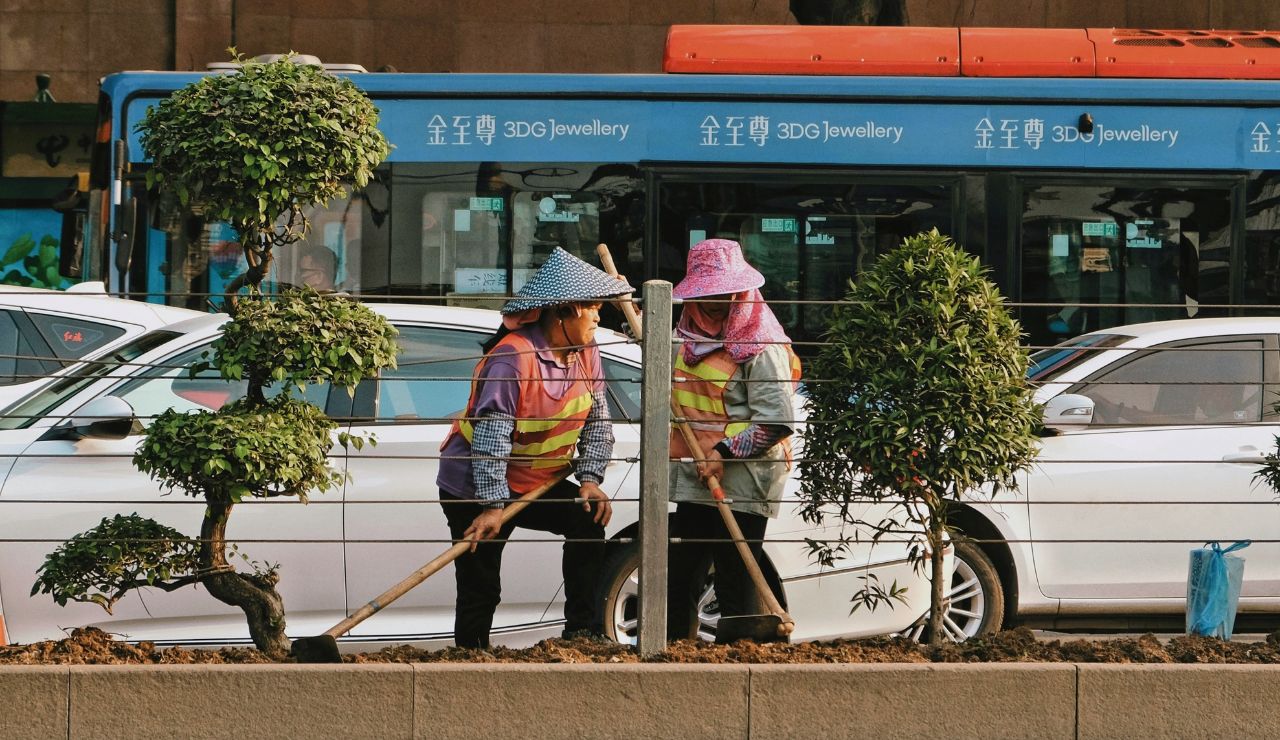 Japanese residents participating in a community street-cleaning effort.