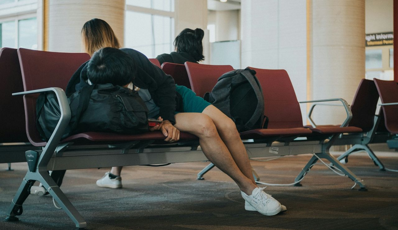 Sleepy traveler arriving early morning after overnight journey