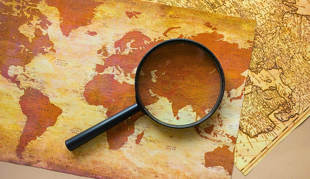 A stylized globe or world map symbolize the idea of relocating famous landmarks.