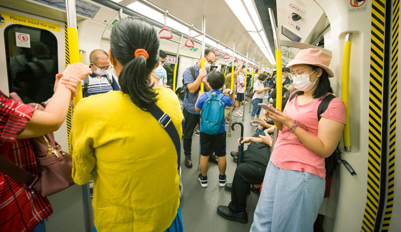 Tourists using clean and efficient metro abroad