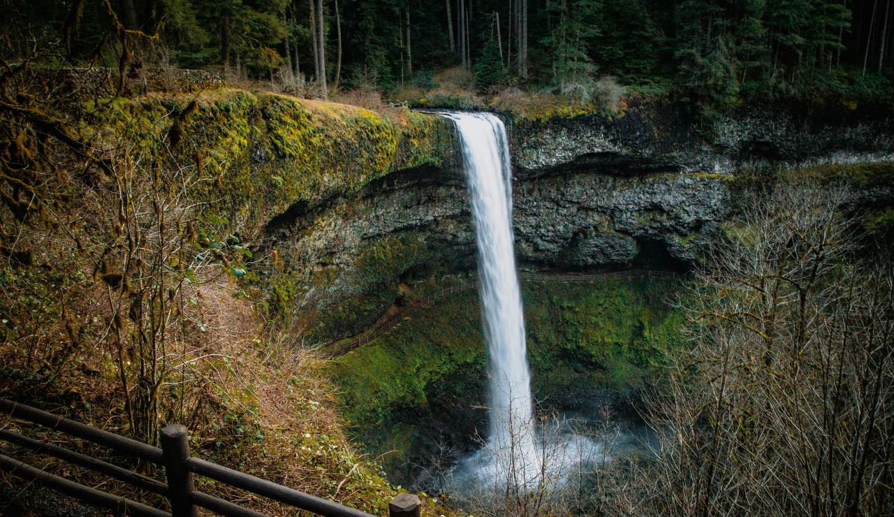 Waterfall with silky flow and vibrant moss-covered rocks
