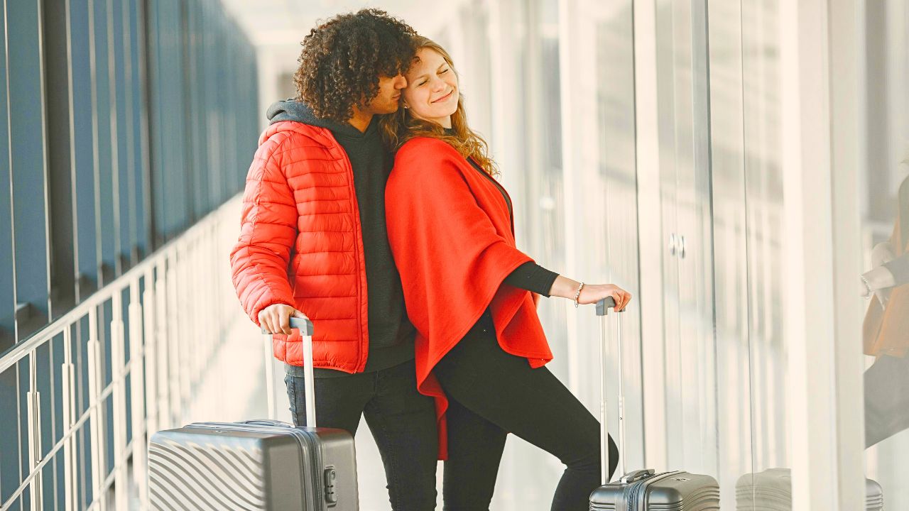 Couple enjoying at airport after a long-haul flight.