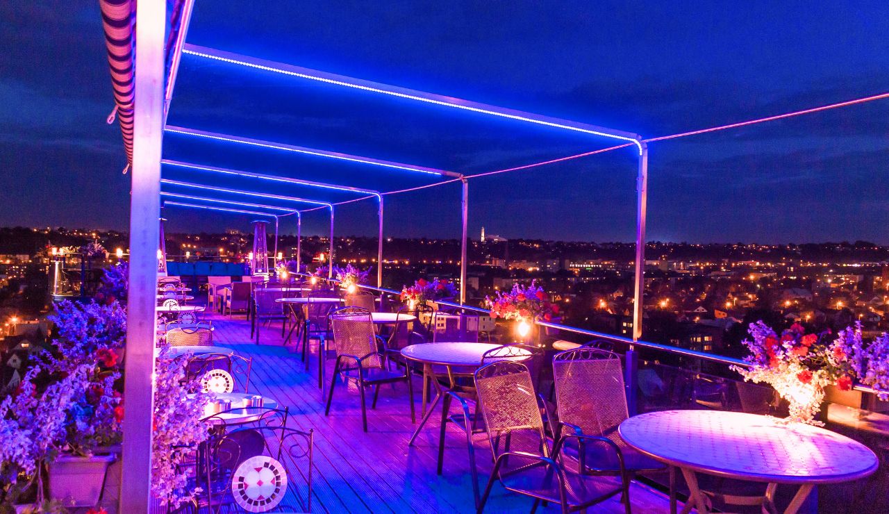 Rooftop patio of Búho Café in Mexico City with rustic charm.