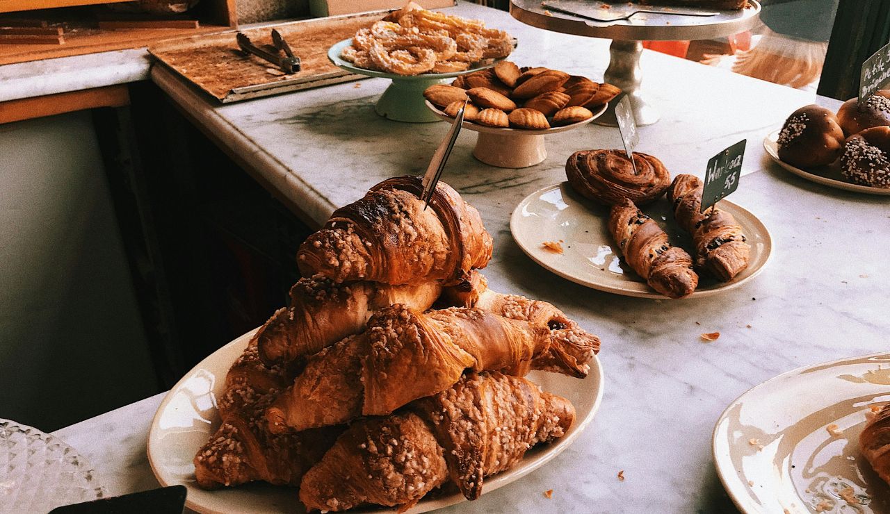 Flaky croissants displayed in sleek, minimalist Lune Croissanterie.