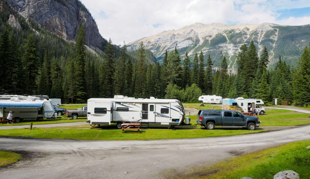 Stargazers at an RV site overlooking Zion’s sandstone cliffs.