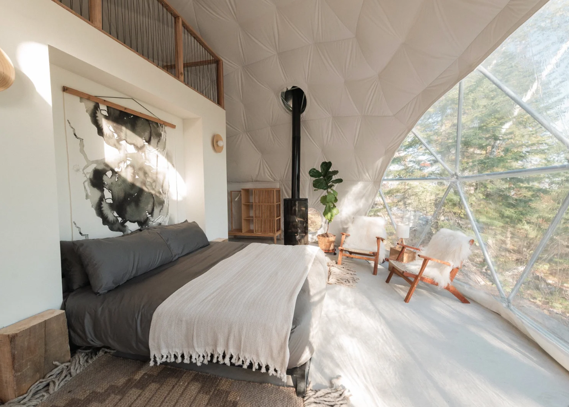 Inside a geometric dome at Klarhet, one of the most romantic glamping cabins.