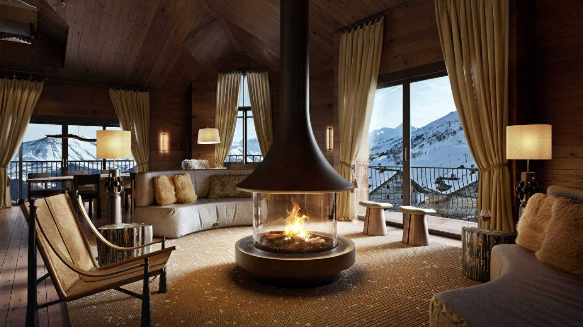 Cozy wood-walled living room with modern furniture, central fireplace, large windows, and snowy mountain views.