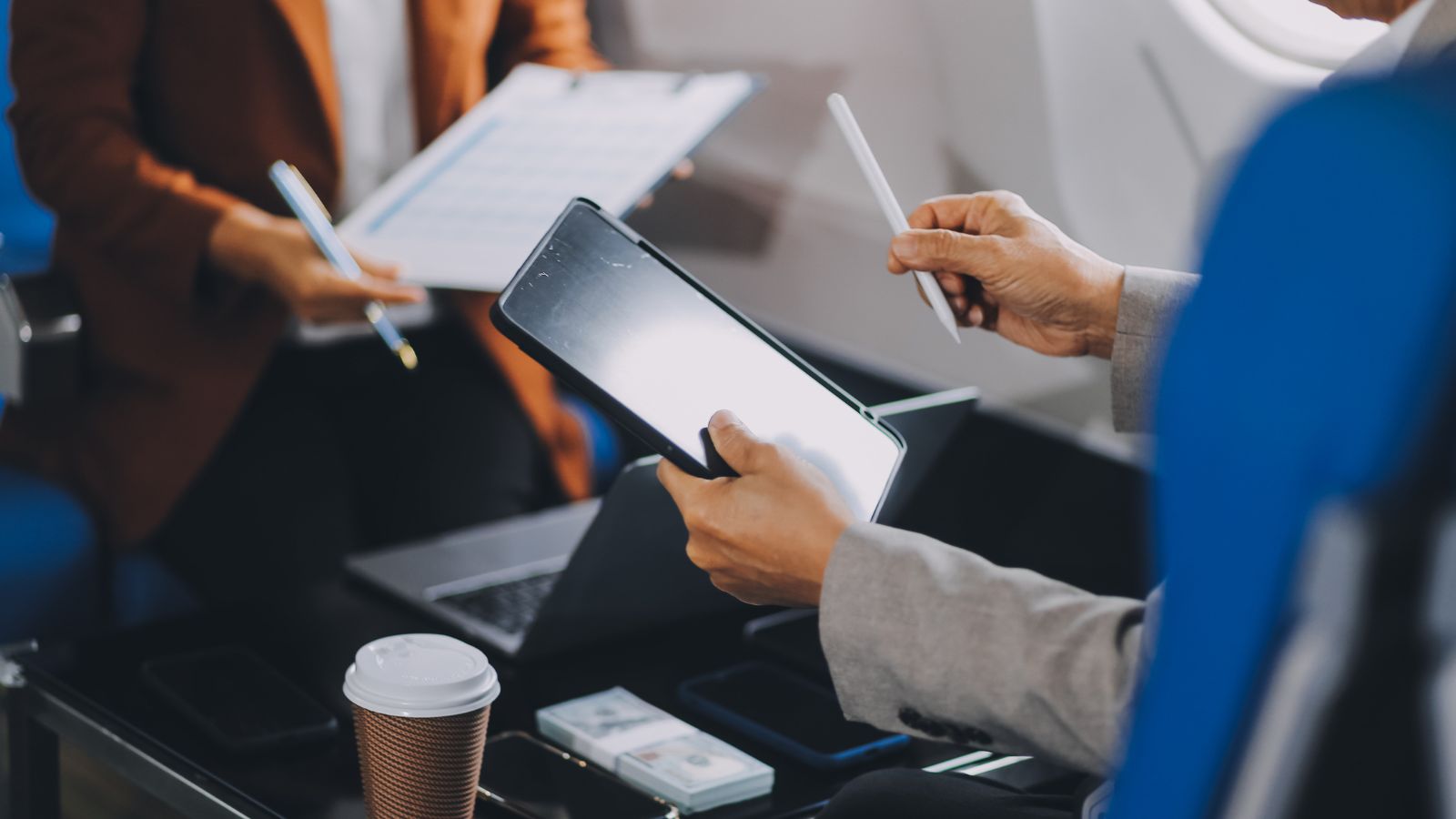 A hand photo of a person trying to book a flight.