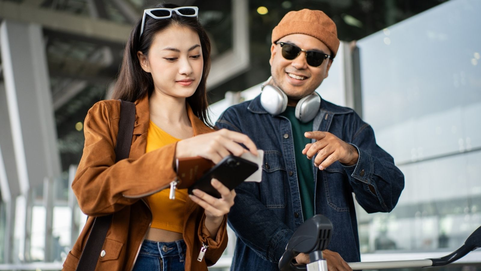 A couple that is calmly looking at the passport.