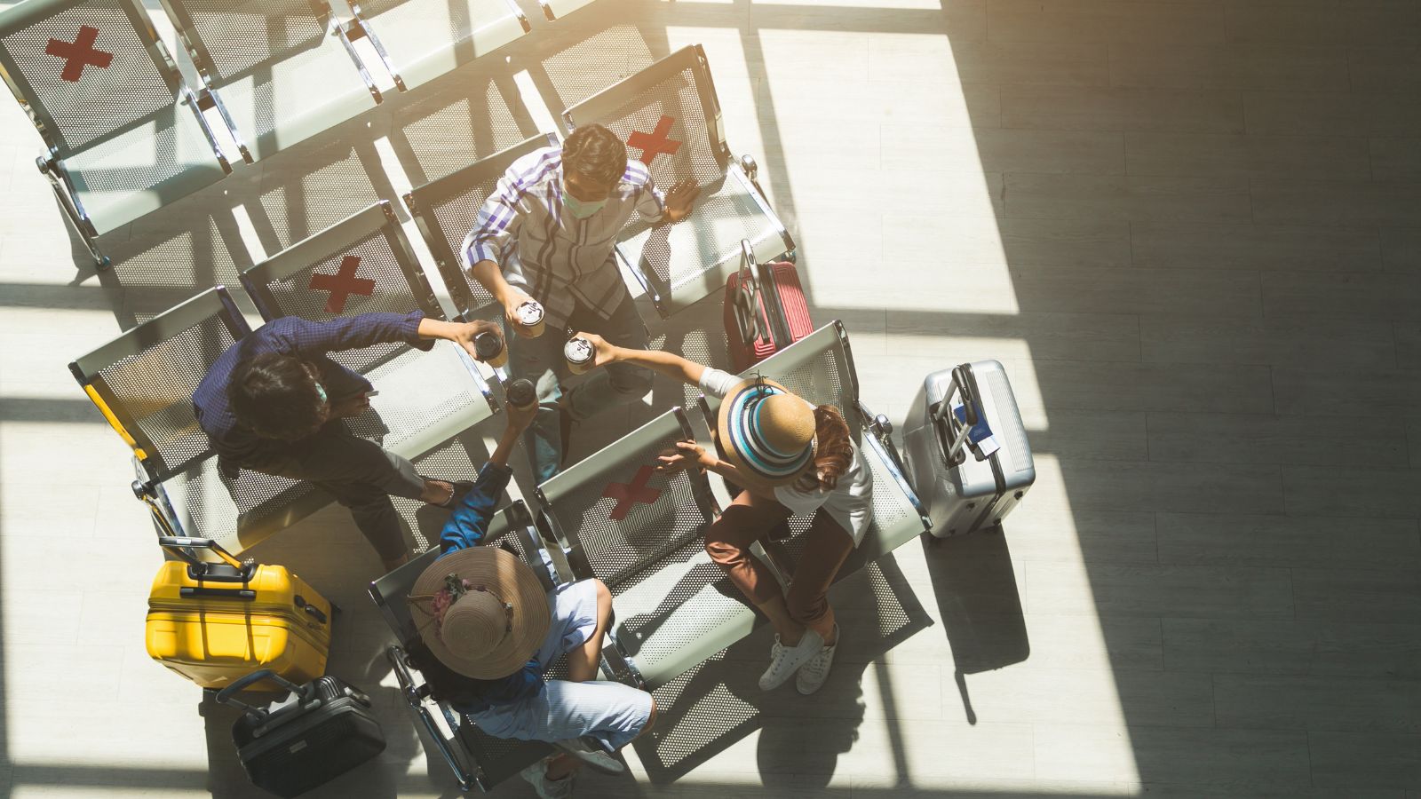 A picture of a group of passengers showing their passports.