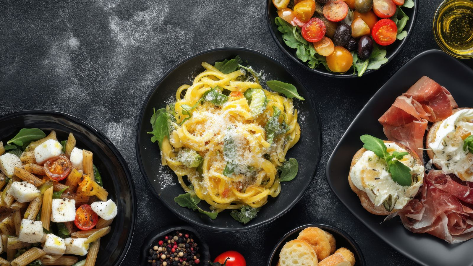 A photo of Italian restaurant table with multiple courses being served.