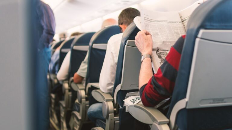 A photo of a passengers in plane.