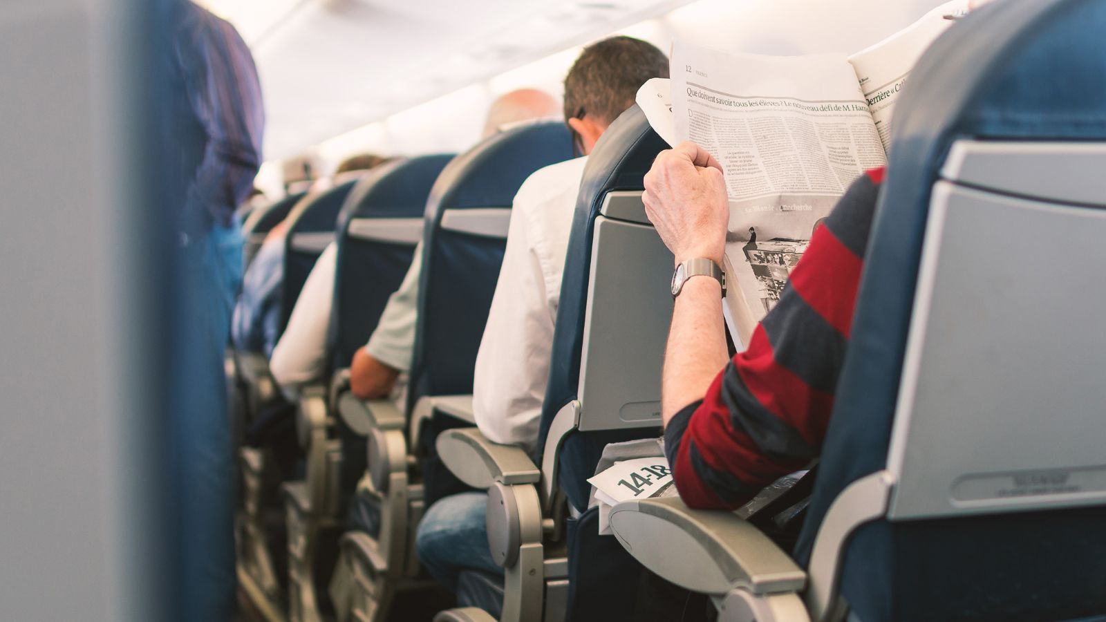 A photo of a passengers in plane.