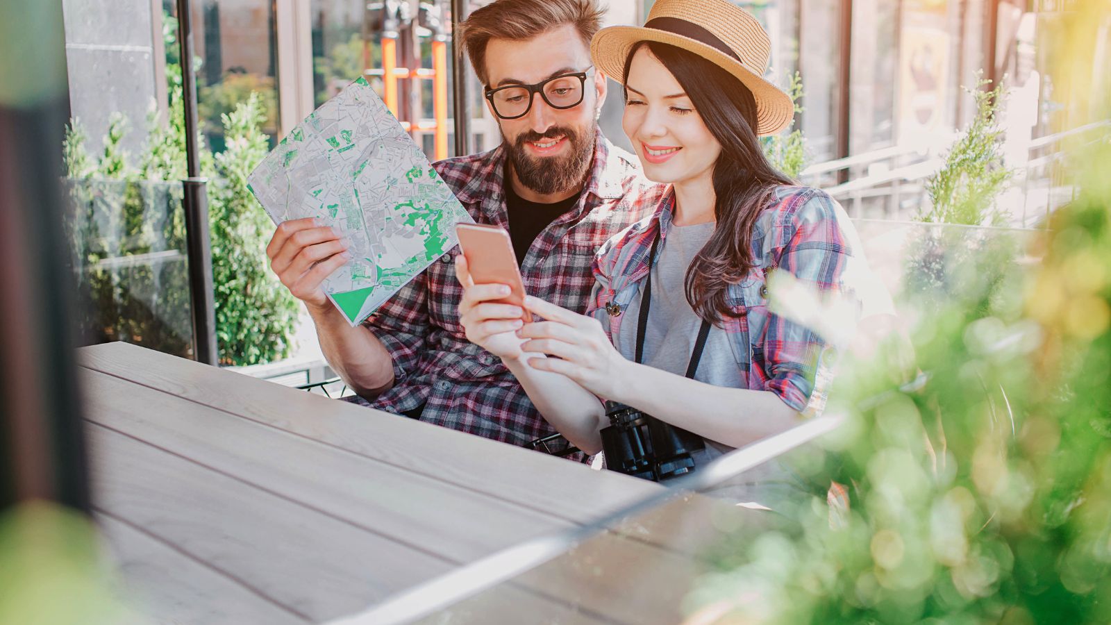 A photo of a Couple reviewing travel itinerary.