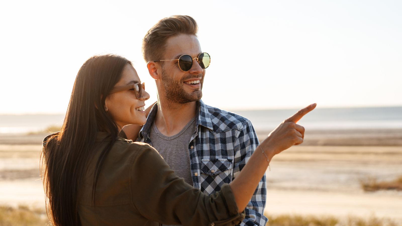 A photo of a Confident couple enjoying trip.