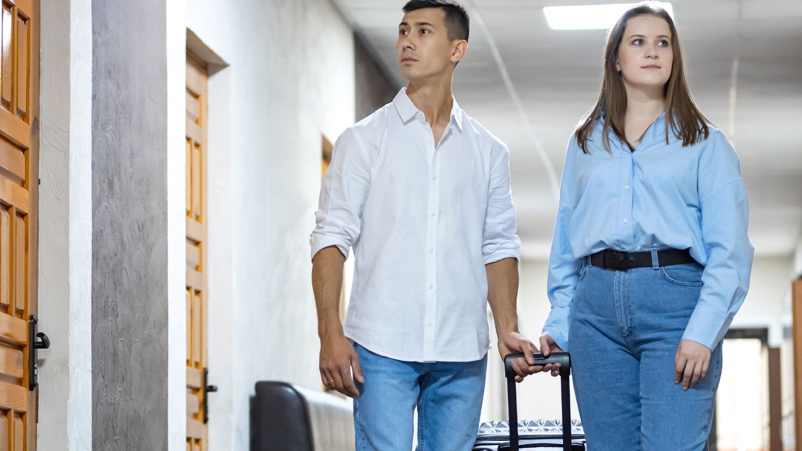A photo that shows Couple peaceful hotel departure.