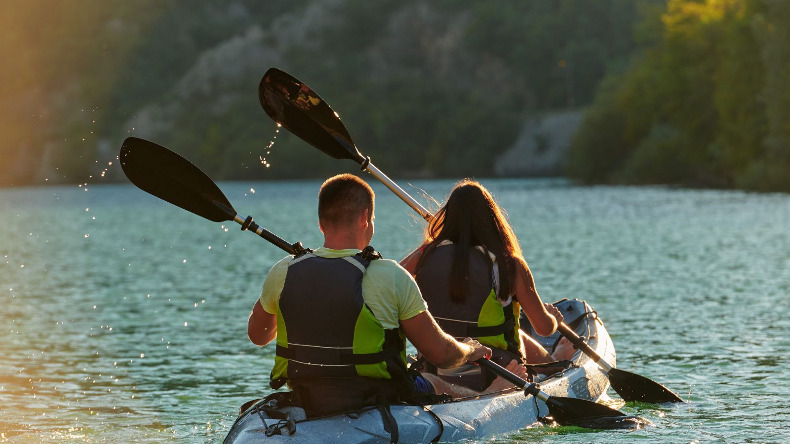 A photo of the Couple kayaking together.