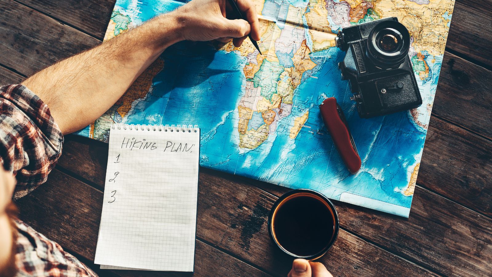 A photo of a Traveler planning budget trip map.