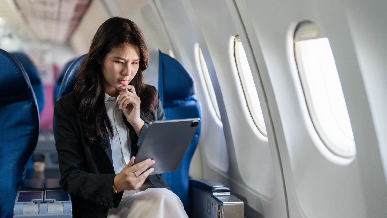 A photo of a Passenger selecting airplane seat screen.